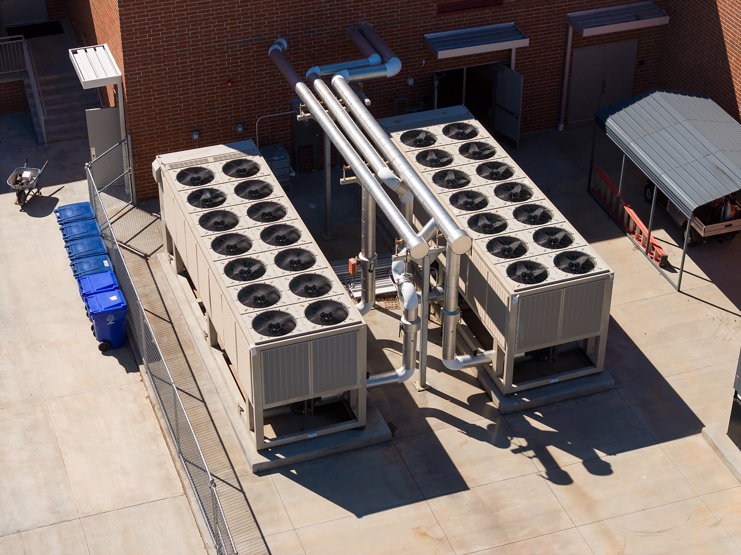 Dual air-cooled chiller units with piping system